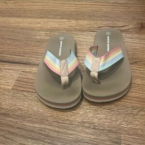 Wave zone rainbow flip flops